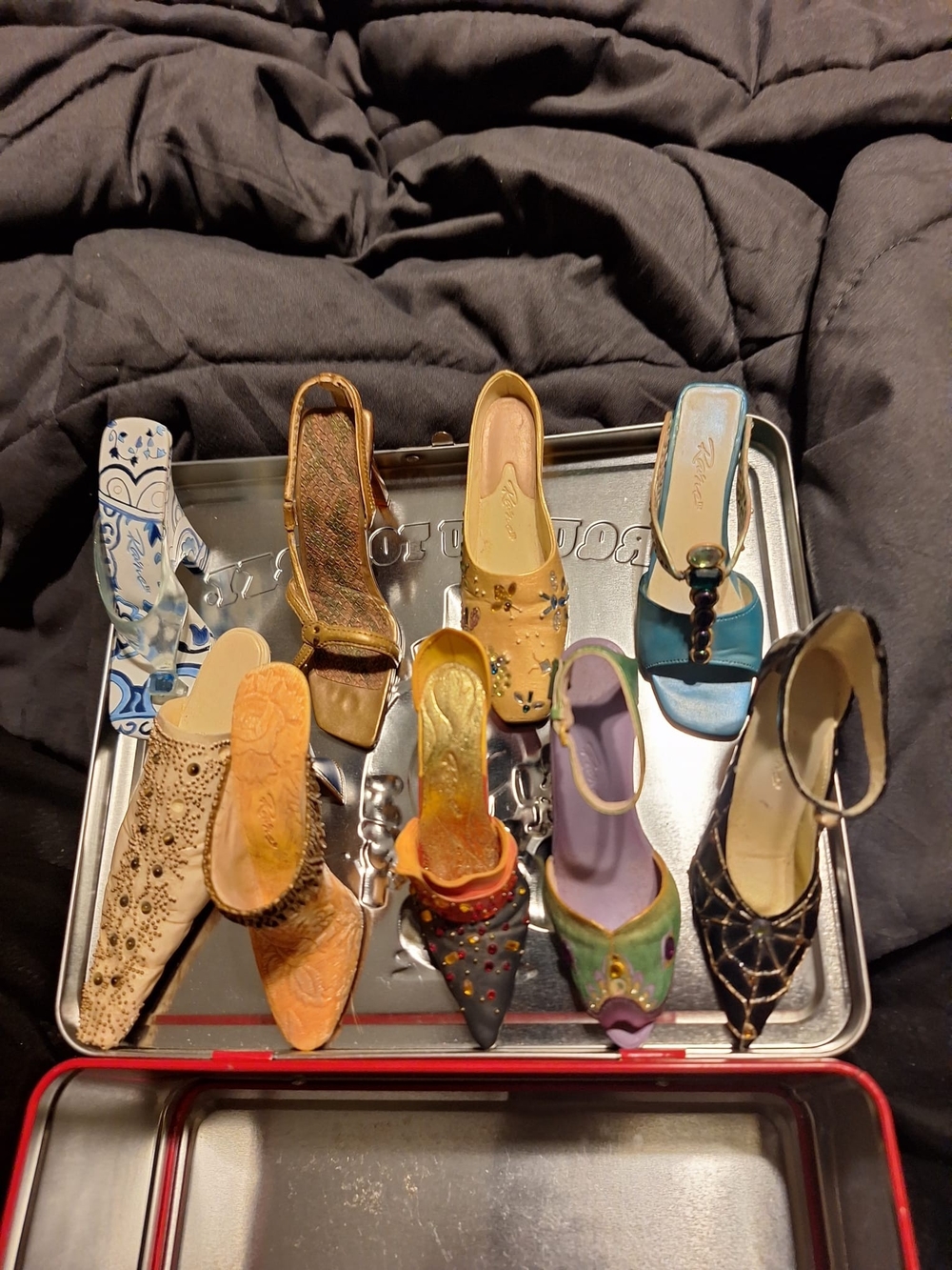 miniature collectible shoes, similar in style to the "Just th